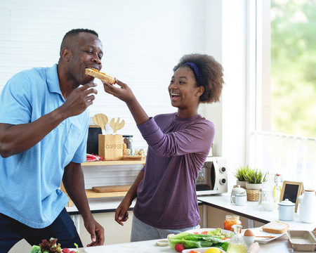 daughter feeding father for father's day