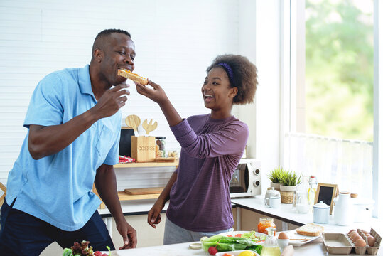 daughter feeding father for father's day